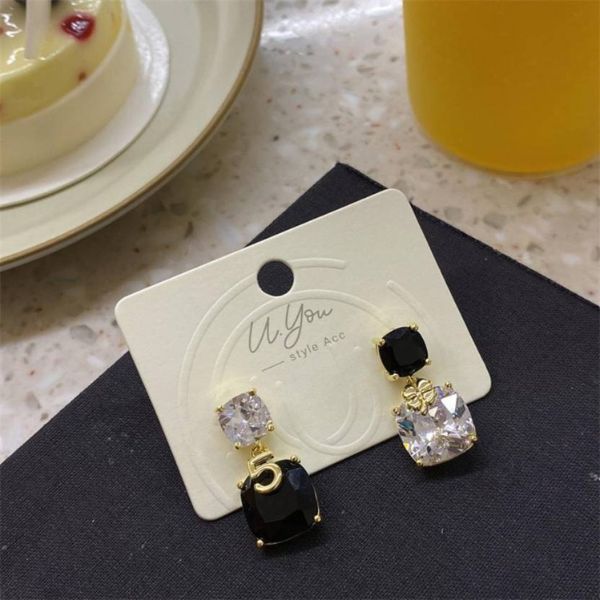 Gold plated korean black stone decore drope earrings for women and girls