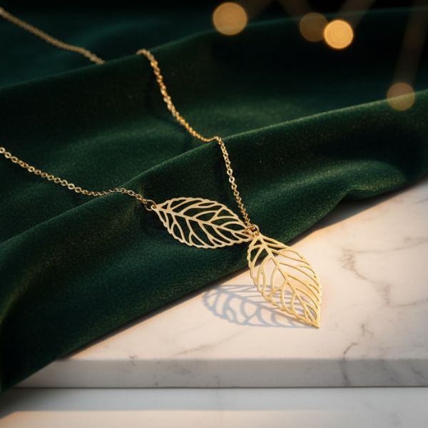 Double Leaf Pendant Golden Necklace – Nature Inspired Statement Jewelry