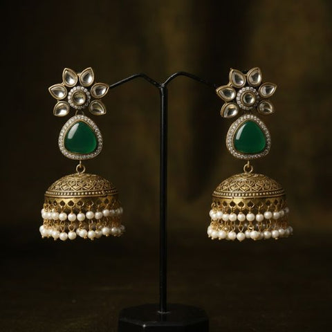 Vintage Gold-Plated Jhumka Earrings with Green Gemstone and Pearl Tassels